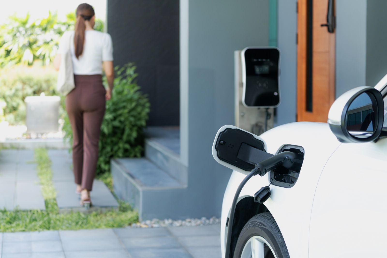 Level 2 EV charger installed on home exterior wall — Duke Energy EV charger rebate North Carolina