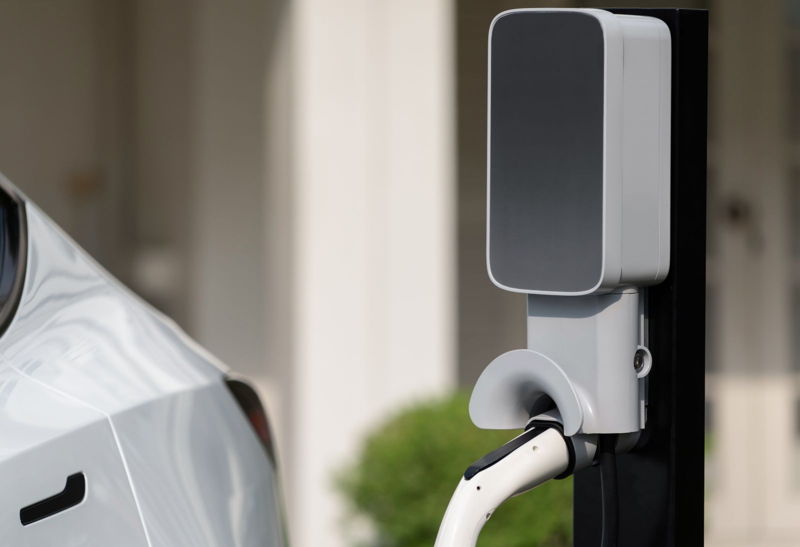 Home EV charging station on garage wall — electrical panel upgrade for EV charger North Carolina