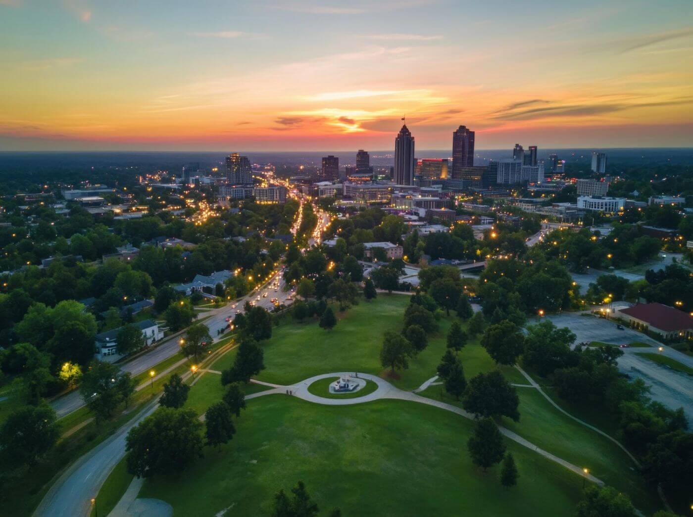 Aerial view of Raleigh, North Carolina, EV charger installation, solar panels, and battery storage service area